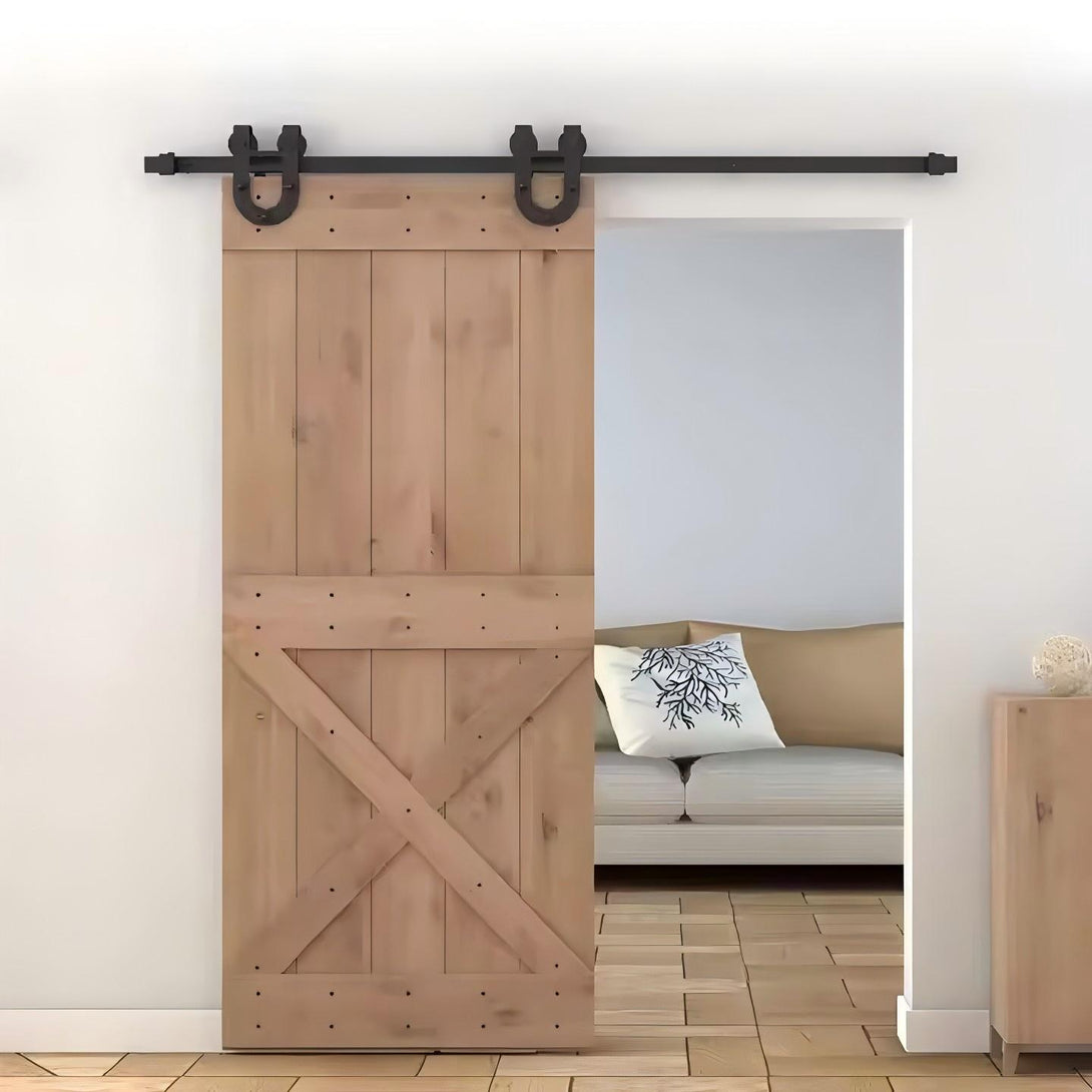 Light wood barn door with black horseshoe hardware, sliding door kit ideal for home decor